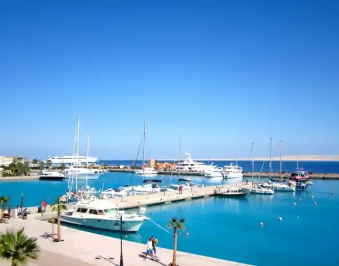 Luxury-Yachts-Docked-In-The-Marina-With-Clear-Blue-Water-In-Hurghada-EgyptaTours