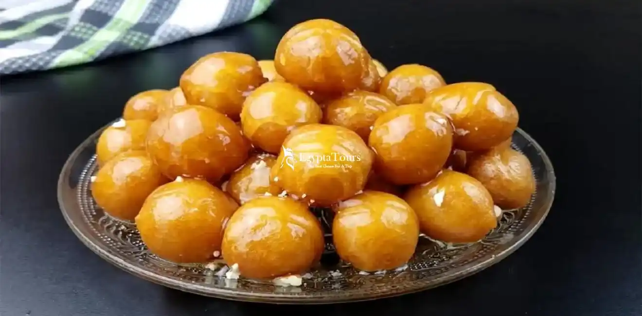 Egyptian-Dishes-Zalabya-Fried-Dough-Balls-With-Honey-Syrup-EgyptaTours