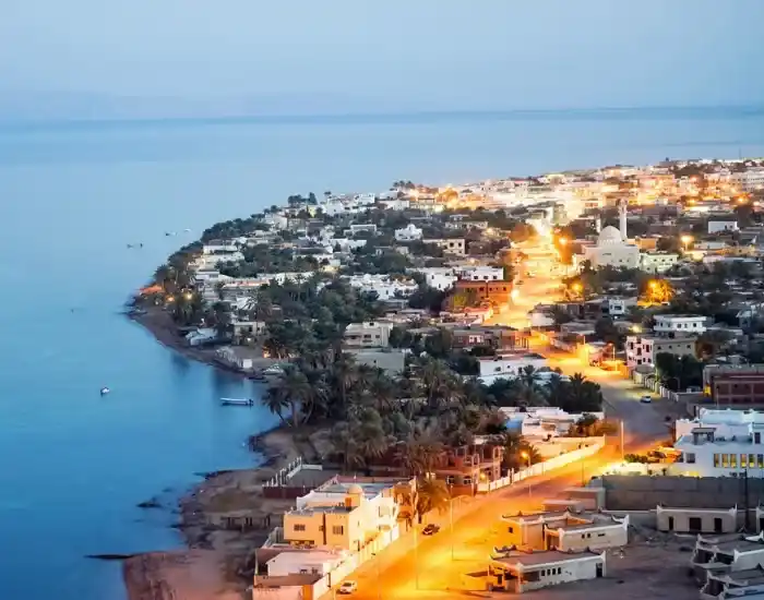 Illuminated-Coastal-Town-Of-Dahab-Along-The-Red-Sea-At-Dusk-EgyptaTours