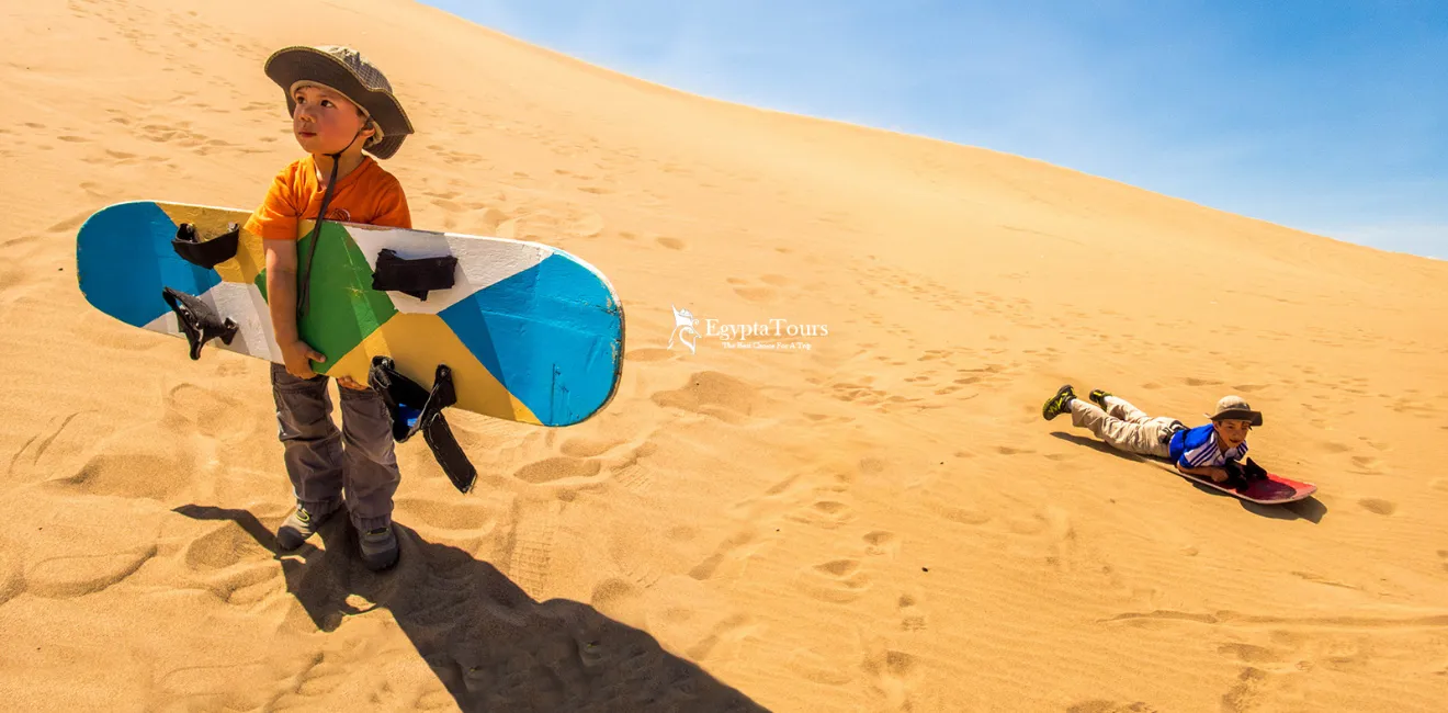 Family-Activities-In-Egypt-For-Kids-Sandboarding-Desert-Adventure